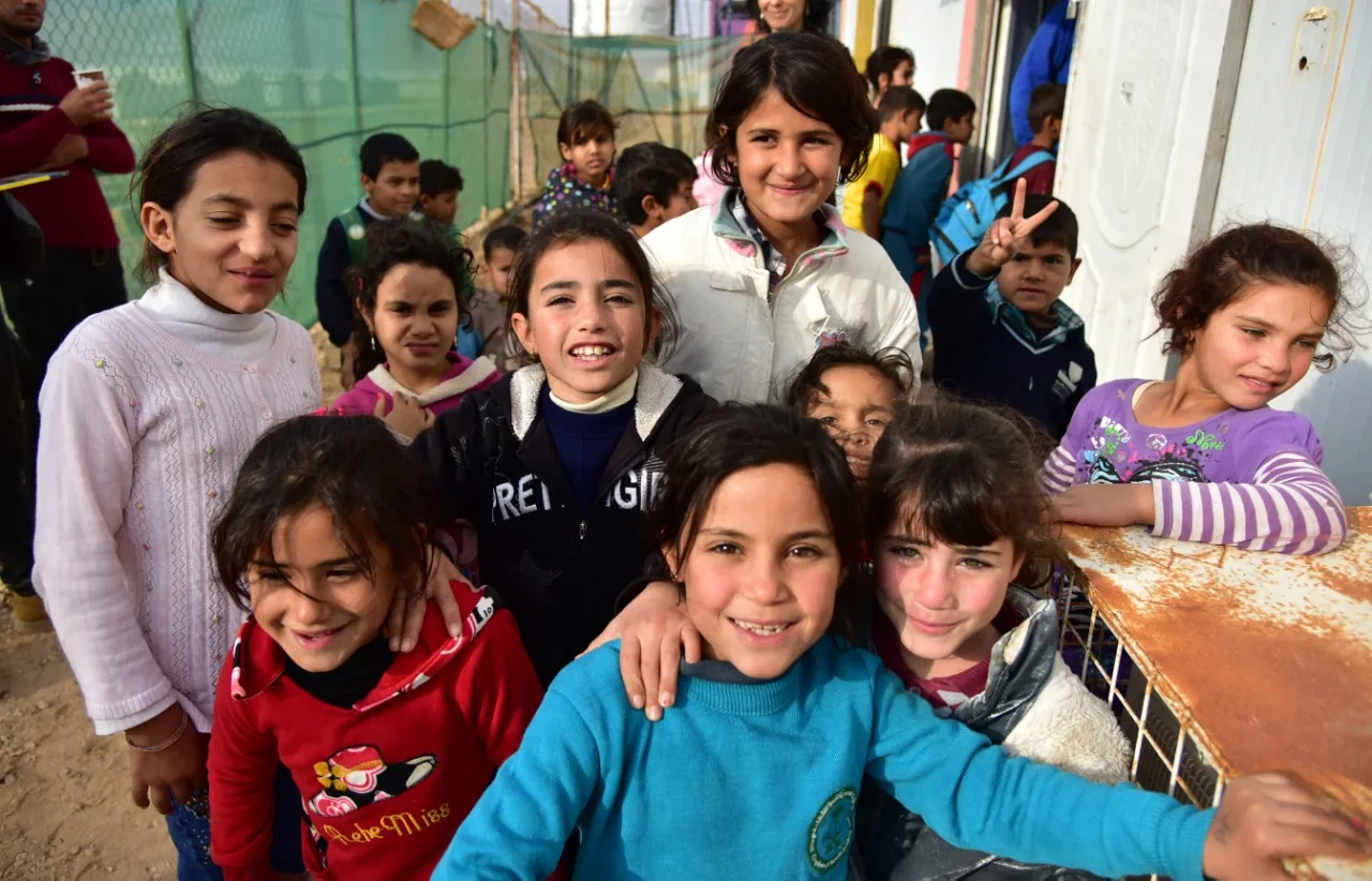 Children gathered together for a group photograph.